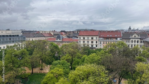 Greenery in the middle of houses. Cloudy weather in Budapest. Panoramic view of Budapest. 