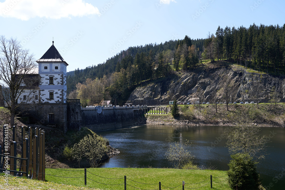 Fototapeta premium Spindleruv Mlyn, Czech Republic - April 27, 2024 - The Labska Reservoir or Labska Dam near Spindleruv Mlyn at the beginning of spring