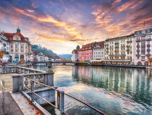 Fabulous historic city center of Lucerne with famous buildings and calm waters of Reuss river. photo