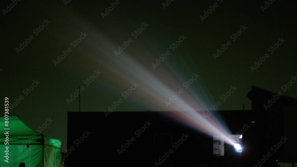 Light from a projector at a drive in movie