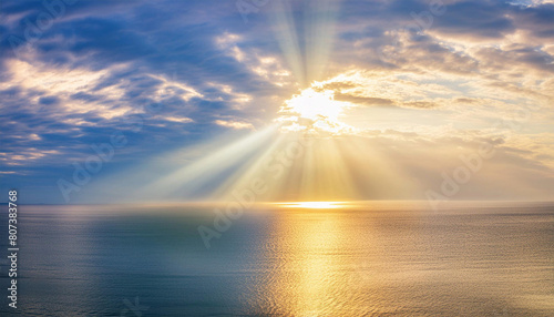 Light from heaven, bright sunlight with reflection in water.	