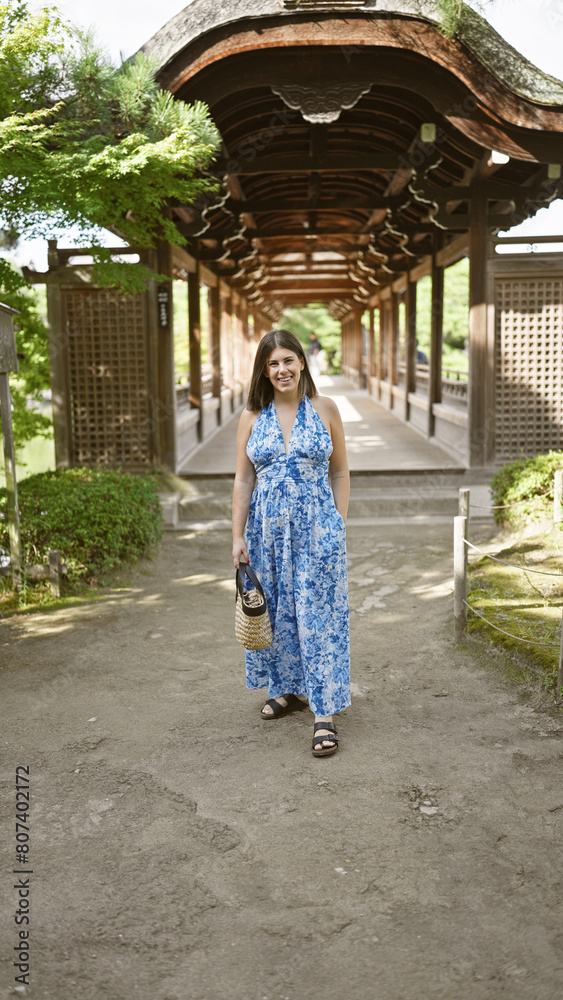 Beautiful hispanic woman, a radiant portrait of happiness and confidence, smiling and posing joyfully at traditional heian jingu in kyoto, japan, portraying carefree fun and success Beautiful hispanic woman, a radiant portrait of happiness and confidence, smiling and posing joyfully at traditional heian jingu in kyoto, japan, portraying carefree fun and success
