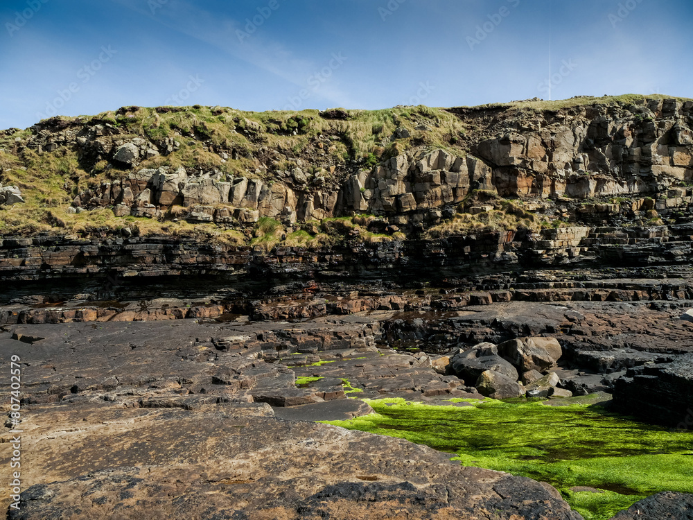 Cliff of rough Irish coastline. Mullaghmore area, county Sligo, Ireland. Popular tourist area with stunning nature scenery. Nobody.