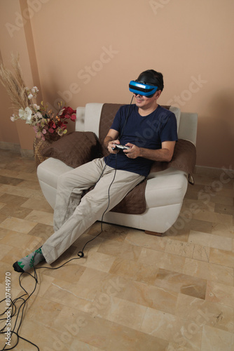 Latin adult with mixed reality headset playing in living room, virtual reality video game concept