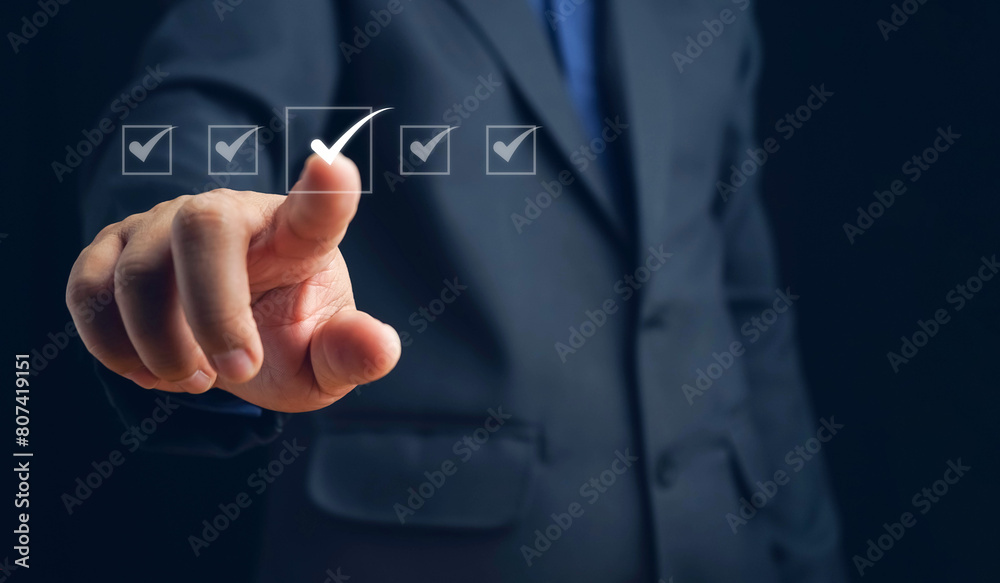 Business performance checklist, businessman using laptop doing online checklist survey, filling out digital form checklist, take an assessment, questionnaire, evaluation, online survey, online exam. Business performance checklist, businessman using laptop doing online checklist survey, filling out digital form checklist, take an assessment, questionnaire, evaluation, online survey, online exam.