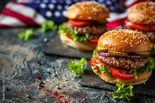 Copy Space burgers for Independence Day, featuring classic American fare adorned with patriotic flag-themed decorations, embodying tradition and national pride photo