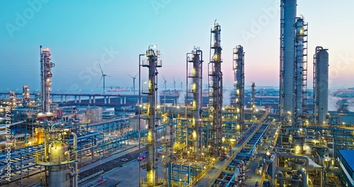 Aerial view of industrial area refinery and chemical plant at sunset