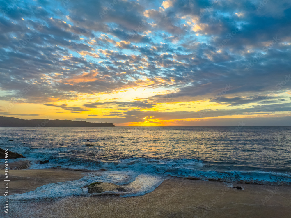 After the rain sunrise at the seaside