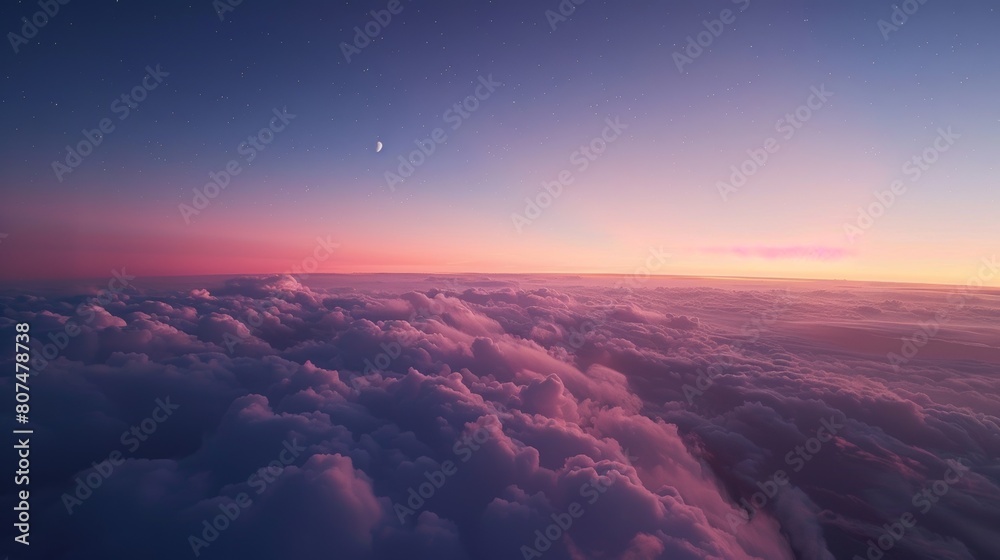Beautiful cloudscape and crescent moon seen from an airplane window.