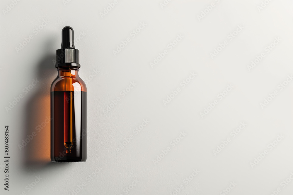Glass bottle containing skin serum placed against a clean white backdrop. Visual representation of a dropper bottle for cosmetics. Glass bottle containing skin serum placed against a clean white backdrop. Visual representation of a dropper bottle for cosmetics.