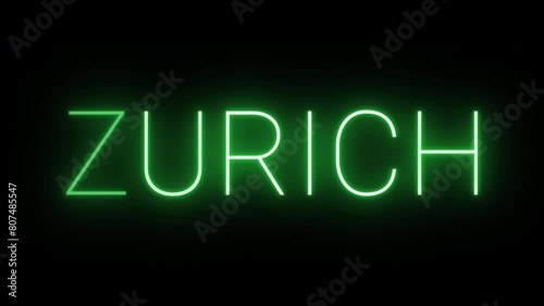 Flickering neon green glowing zurich text animated on black background photo