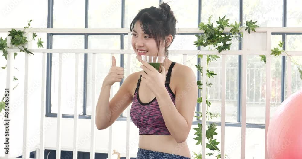 Women hands holding smoothie detox green juice fresh fruit cool drinking. Asian women smile laugh drinking vegan vegetable cool wellness beverage. Female pouring celery juice drink cocktail glass Women hands holding smoothie detox green juice fresh fruit cool drinking. Asian women smile laugh drinking vegan vegetable cool wellness beverage. Female pouring celery juice drink cocktail glass