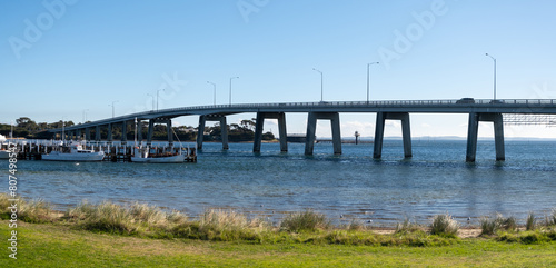 Panoramic coastal scenery of Phillip Island bridge and ships berth by the shore. at San Remo, VIC Australia.It is a cantilever bridge in Victoria that connects the Australian mainland. © Doublelee