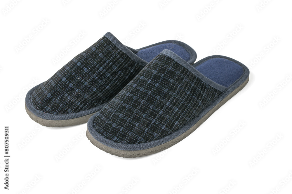A pair of men's home slippers isolated on a white background. Comfortable home shoes. A pair of men's home slippers isolated on a white background. Comfortable home shoes.