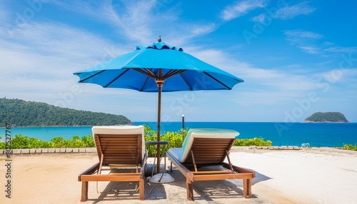 blue umbrella and sea facing chairs under Blue sky  Summer days in beach