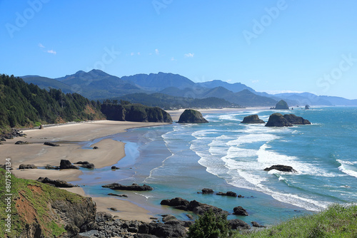 View from Ecola State Park Viewpoint overlooking Crescent Beach and in the distance Canon Beach with its famous Haystack Rock - Oregpn, Pacific Northwest