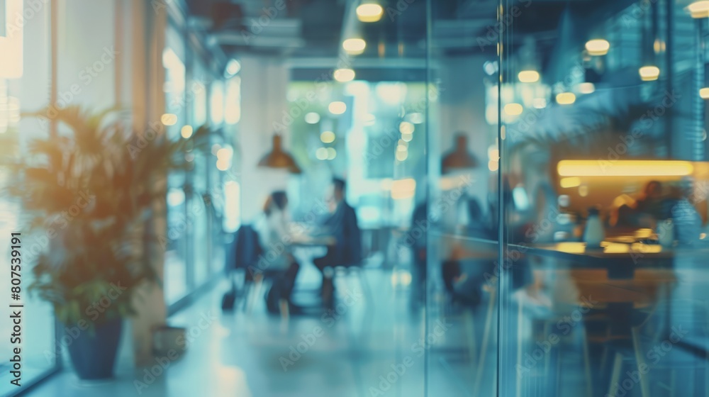 Blurred offices with people working behind glass walls Blurred offices with people working behind glass walls