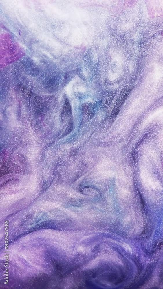 Vertical video. Glitter ink splash. Paint water. Pink blue purple color glowing shiny vapor mix texture motion decorative abstract art background. Vertical video. Glitter ink splash. Paint water. Pink blue purple color glowing shiny vapor mix texture motion decorative abstract art background.
