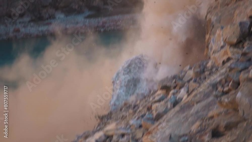 Rocks falling from mountain due to landslide in Manali, Himachal Pradesh, India. Natural calamity. Natural disaster in mountains during monsoon. Stones falling.