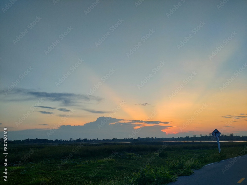 Obraz premium sunset over the river