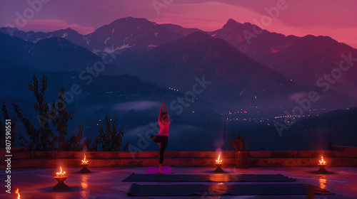 Sunrise Yoga on the Terrace - A person performing yoga poses on the terrace  with the mountains lit up in the background.