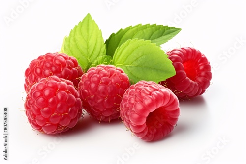 a group of raspberries with leaves