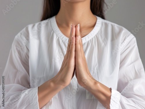 a close up of a woman's hands together