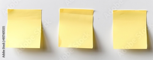Three blank sticky notes on a white background