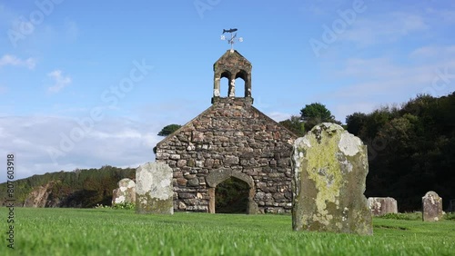 Ruins of Church of St. Brynach the Abbot, Cwm-yr-Eglwys Village, Wales UK on Sunny Day photo