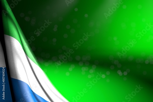 pretty image of Sierra Leone flag hangs diagonal on green with selective focus and empty place for your text - any celebration flag 3d illustration..