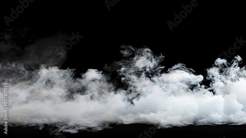 Black and white smoke billowing on a dark backdrop
