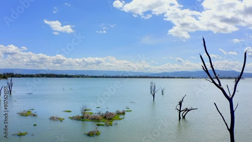 HD aerial footage of big Lake Naivasha in Nakuru County. Great Rift Valley in Kenya. Colorful landscapes of African wild nature on a sunny day. photo