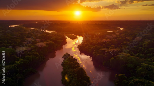 An enchanting sunset over the vast Amazon Rainforest reveals the rich biodiversity of Brazil, Peru, Colombia, and other Amazonian nations in the Amazon Aerial Symphony. photo