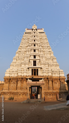 Beautiful White Vellai Gopuram of Sri Ranganatha Swamy Temple, World Largest Hindu Temple, Srirangam, Tiruchirappalli, Tamil Nadu, India.  photo