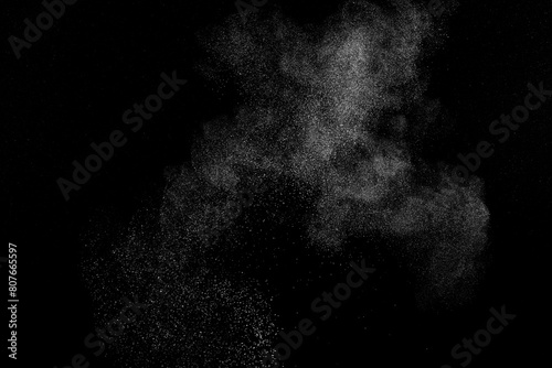 White texture on black background. Dark textured pattern. Abstract dust overlay. Light powder explosion	
