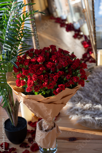 Large red bouquet of roses in a vase, gift for woman, flower shop