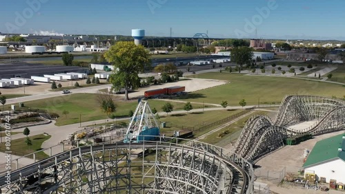 Aerial view of Green Bay Wisconsin Bay Beach Amusement Park Zippin Pippin Roller Coaster with bridge and city in the distance photo