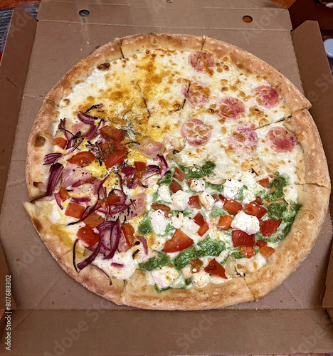 Assorted pizza in a box for delivery