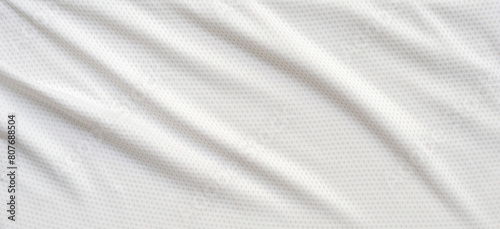 White sports clothing fabric football shirt jersey texture abstract background © Piman Khrutmuang