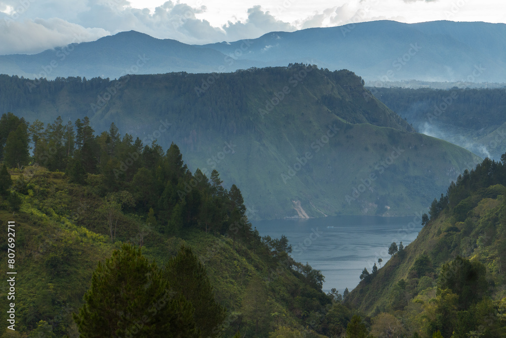 Scenic landscape of the hills and mountains  of  Toba lake and Samosir island in Northern Sumatra in Indonesia