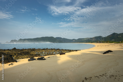 Tampah beach - tranquil, secluded beach with a lengthy stretch of white sand on Lombok island photo