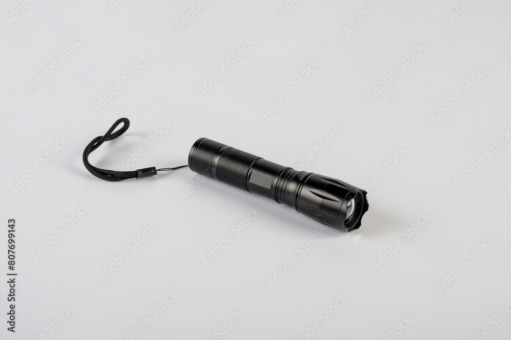 Electric LED torch flashlight isolated on a white background Electric LED torch flashlight isolated on a white background