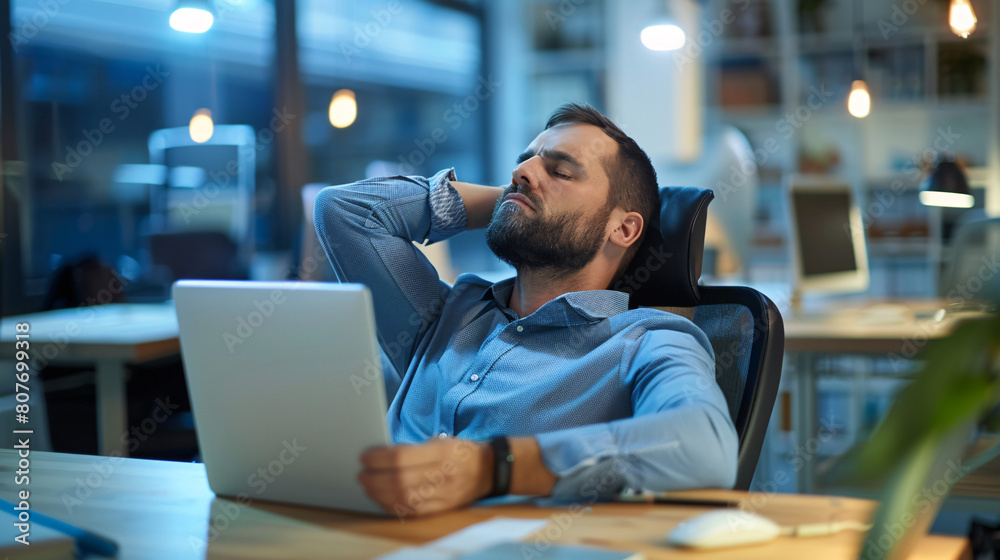 Overworked office employee stretching tight, inflamed neck muscles at desk with computer ergonomic strain visible from poor posture Overworked office employee stretching tight, inflamed neck muscles at desk with computer ergonomic strain visible from poor posture