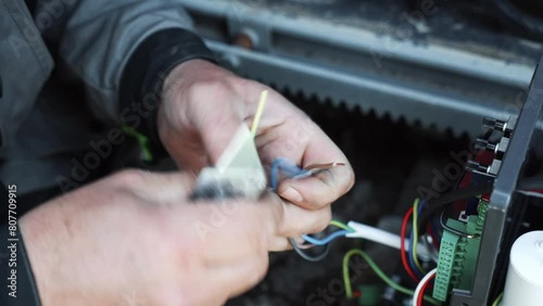 Electrician prepares the installation of electrical wiring. Electrician prepares cables for installation