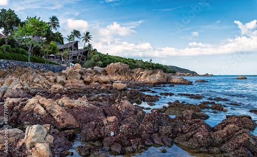 Scenic dramatic landscape of the Koh Samui Island coastline, with rocks and stones on the shore. Thailand
