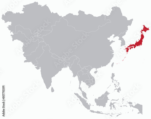 Highlighted red map of JAPAN inside grey detailed blank political map of Asia on light blue background, without the Middle East and Russia