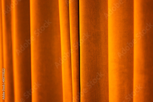 Warm golden velvet curtains abstract background