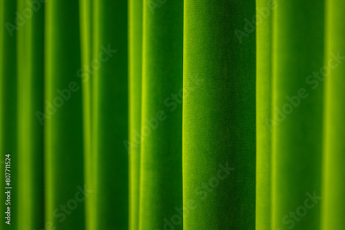 Warm golden velvet curtains abstract background photo