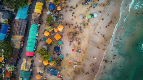 A birdseye view of a beach with colorful umbrellas and tents, surrounded by water and an urban design landscape. Perfect spot for leisure and recreation in the city AIG50 © Summit Art Creations
