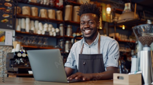 Smiling Entrepreneur with Laptop